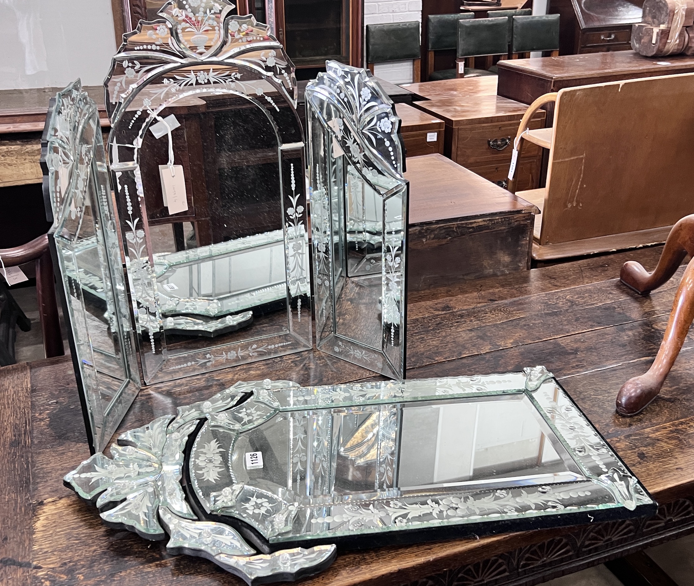 A Venetian style triple dressing table mirror, height 63cm together with a circular wall mirror, height 76cm